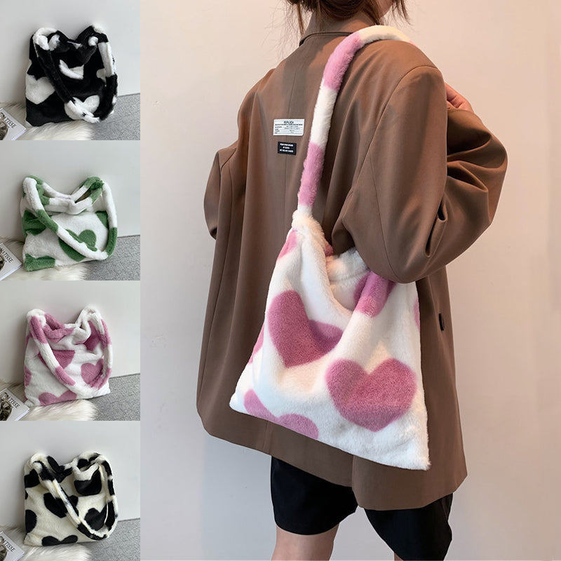 Large plush love heart shoulder bag with geometric patterns for winter shopping