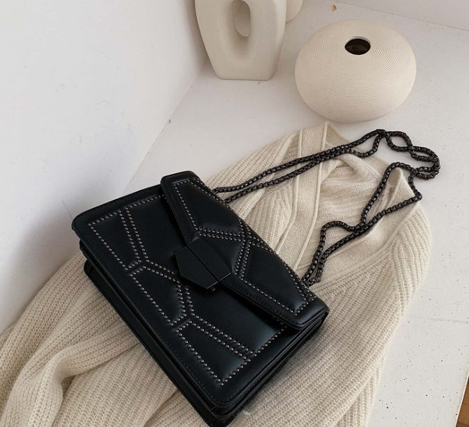 Rivet chain small crossbody bag for women with studded design and chain strap
