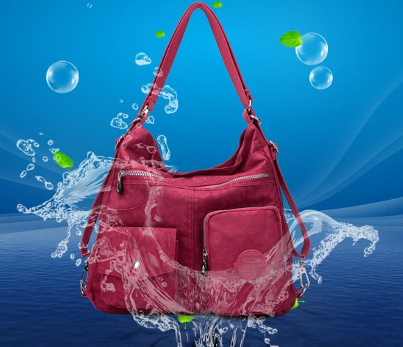 Luxury waterproof nylon crossbody shoulder bag for women in various colors with large capacity and zipper closure